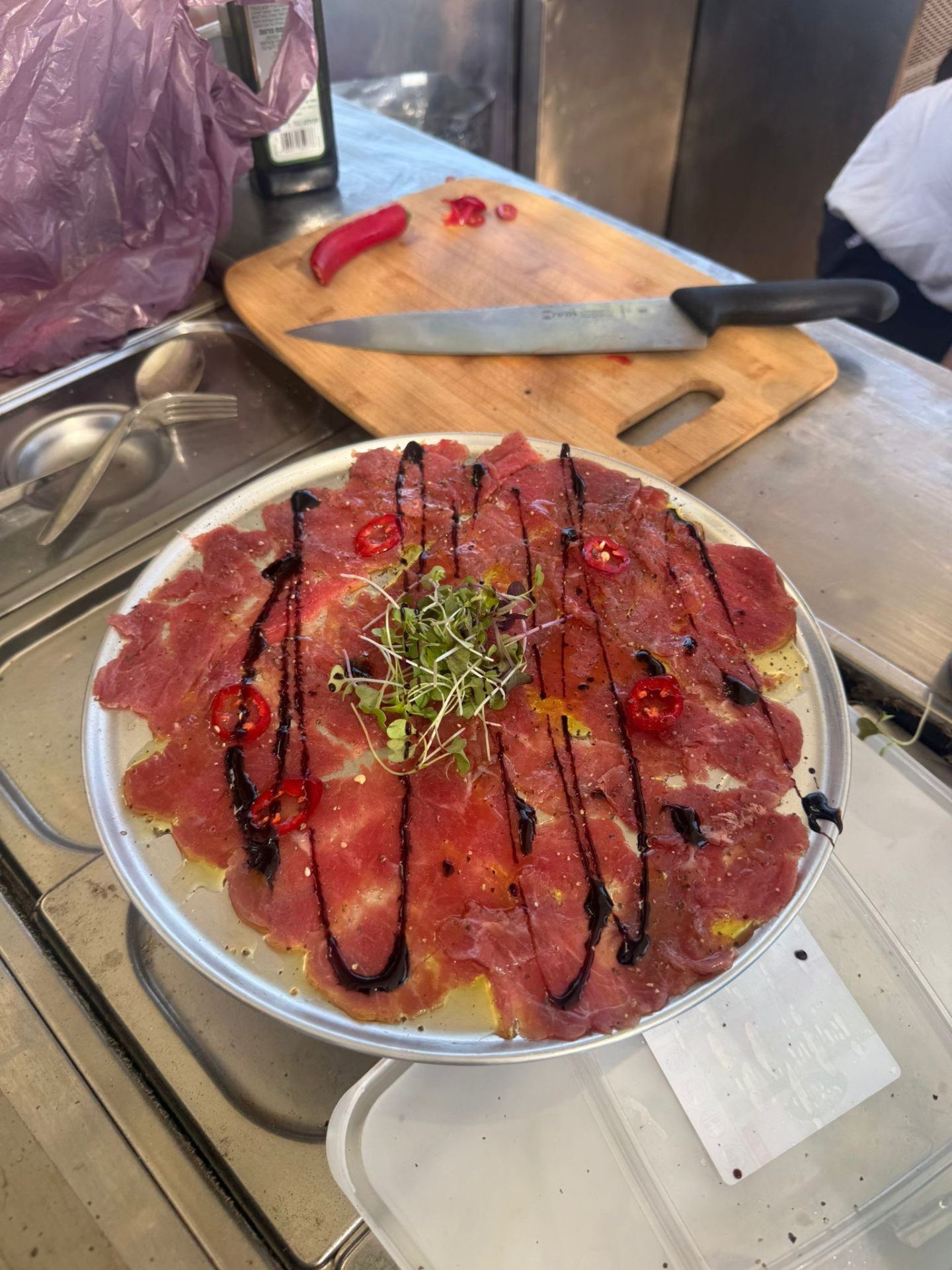 Beef carpaccio with balsamic and micro greens